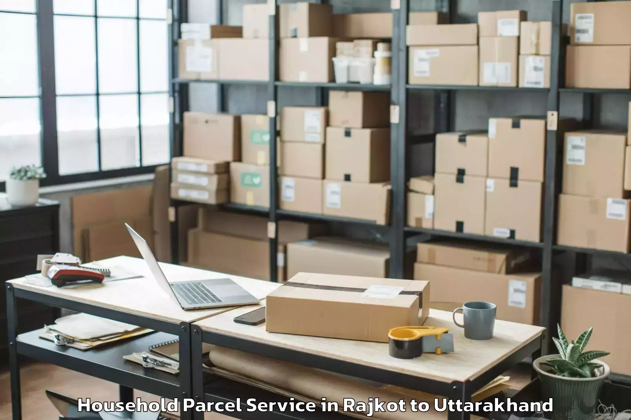 Book Rajkot to Graphic Era Hill University Cl Household Parcel Online